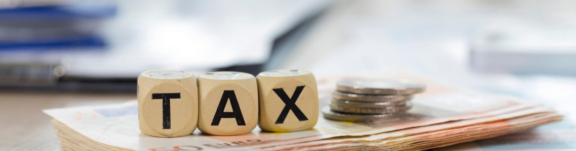 Are Roth IRA Withdrawals Really Tax-Free? Stack of tax bills